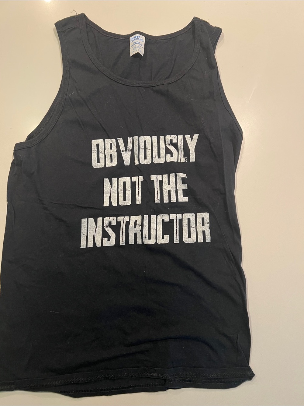 Black Tank Top with "Obviously Not The Instructor" Graphic